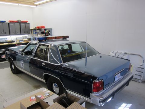 1991 Ford LTD Crown Victoria - This 1991 Ford Crown Victoria LTD police car features a light bar and distinctive two-tone paint scheme.