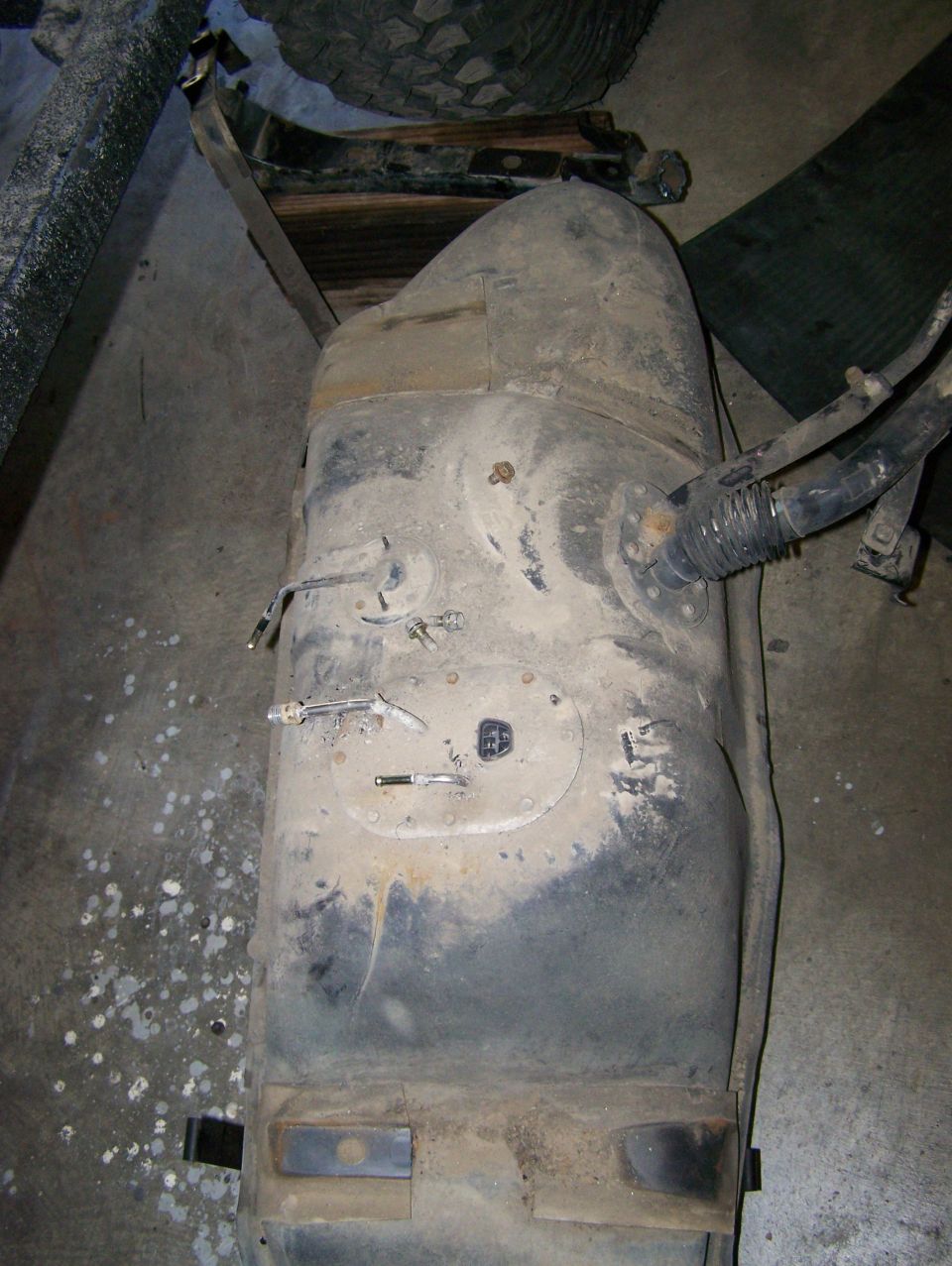 Suzuki Samurai fuel tank with fuel pump assembly visible
