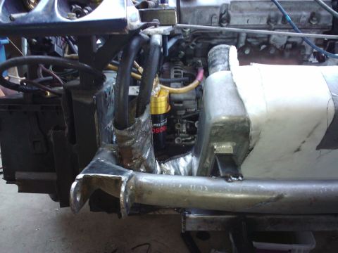1995 Ford Probe - Custom fabrication in an engine bay with a yellow BOSCH oil filter visible.