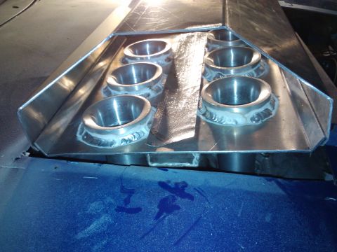 1995 Ford Probe - Close-up of a custom intake manifold with six trumpets, showing welded construction and aluminum finish.
