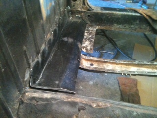 1962 Ford Ranchero - This photo shows the interior floor pan and frame rails of a vehicle undergoing restoration.