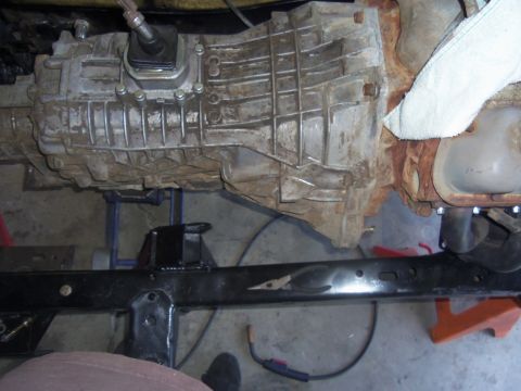 1968 Ford Bronco - Close-up view of a transmission and frame assembly, likely part of a custom vehicle build.