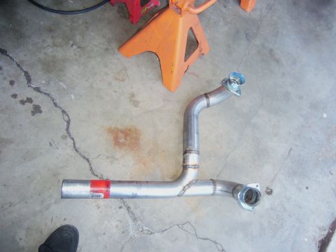 1968 Ford Bronco - Custom exhaust pipe section with flanges, likely for a vehicle modification project.