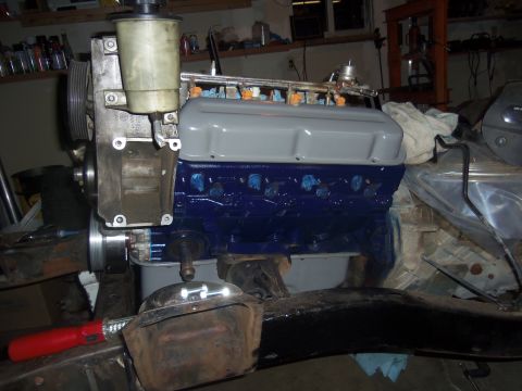 1968 Ford Bronco - Engine block with fuel injectors and power steering pump assembly, likely undergoing a rebuild or modification.