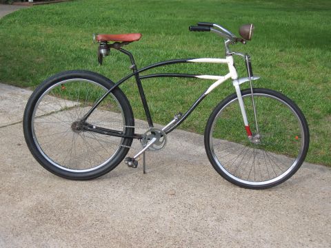 1994 Ford Bronco - This bicycle has a classic cruiser frame with a two-tone paint scheme and wide tires.
