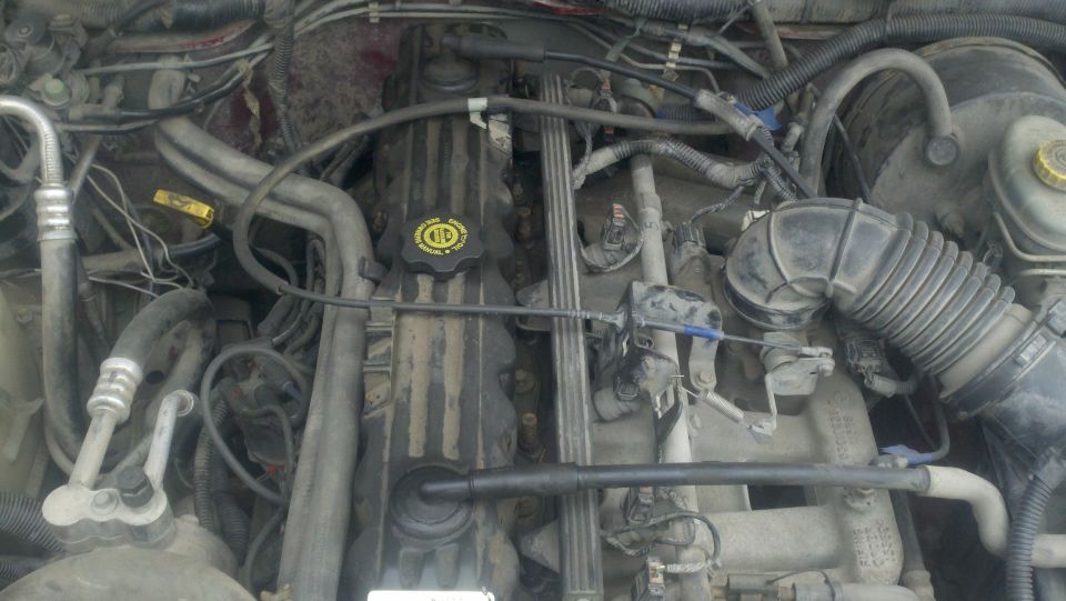 Engine bay with visible Supermotors.net logo