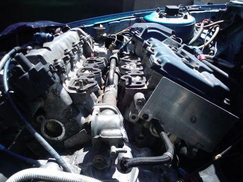 1995 Ford Probe - The engine bay of a vehicle, showing the V6 engine components and wiring.