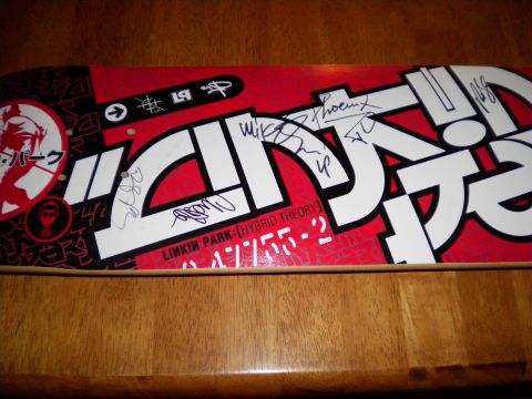 1997 Ford Probe - Skateboard the Linkin Park logo and multiple signatures, likely from the band members.
