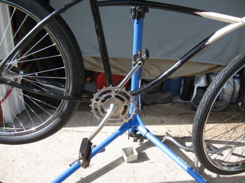 1994 Ford Bronco - Close-up of a bicycle's drivetrain and rear wheel being worked on in a repair stand.