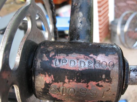 1994 Ford Bronco - A close-up view shows stamped identification numbers on a bicycle's crankset, indicating LPD D2300 and 610991.