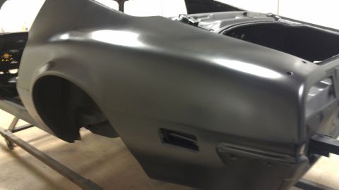 1972 Pontiac Trans Am - A car's rear quarter panel and trunk area are shown in black primer.