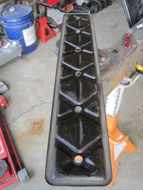 1989 Ford Bronco - Engine valve cover with diamond pattern, possibly removed for maintenance or repair.