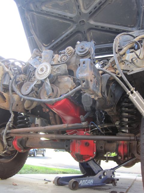 1989 Ford Bronco - Close-up view of engine and chassis components, likely during maintenance or repair.
