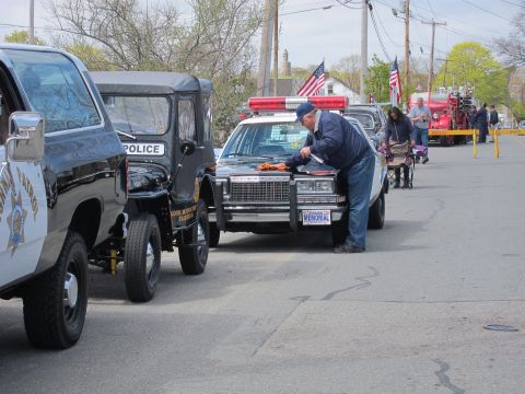 1991 Ford Crown Victoria - Police car detail at an event. Multiple emergency vehicles are present.
