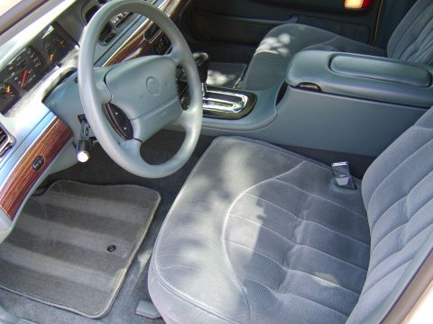 1996 Mercury Grand Marquis - Interior view of a 1996 Mercury Grand Marquis, highlighting the dashboard and seating.
