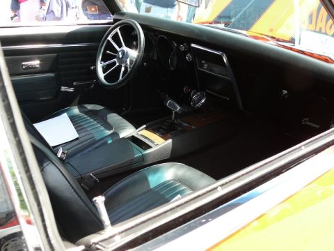 1968 Chevrolet Camaro - The interior of a 1968 Chevrolet Camaro shows its classic dashboard, seats, and center console.