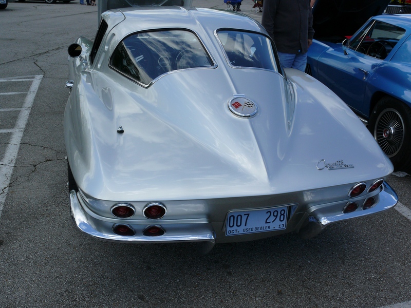 1963 Chevrolet Corvette Sting Ray rear with split window coupe body, quad taillights, and license plate 007 298