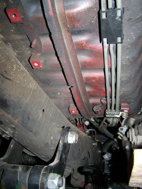 1988 Suzuki Samurai - Undercarriage view shows brake lines and frame rails, with no clear year identification.
