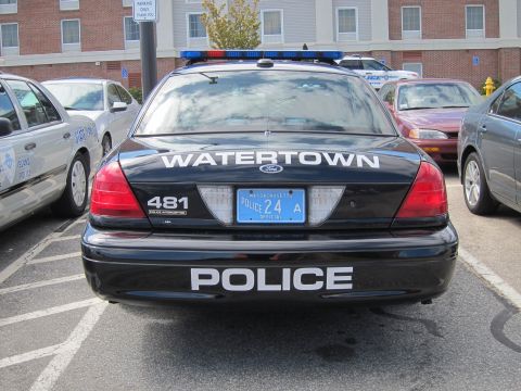 1991 Ford LTD Crown Victoria - black-and-white Watertown Police Ford Crown Victoria shown directly from the rear, displaying a Massachusetts police plate reading 24.