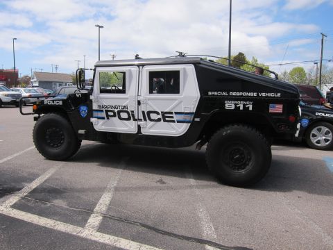 1991 Ford LTD Crown Victoria - Side view of a black-and-white Barrington Police Hummer H1 marked Special Response Vehicle on oversized off-road tires.
