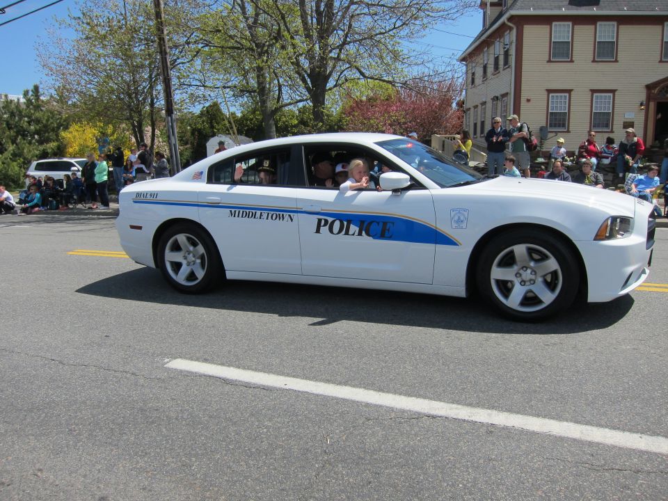 White Dodge Charger Middletown Police cruiser, side view, in parade