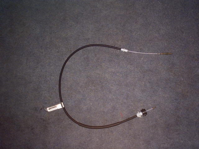 Clutch cable with black outer sheath and silver inner wire, showing metal ends and a white plastic clip