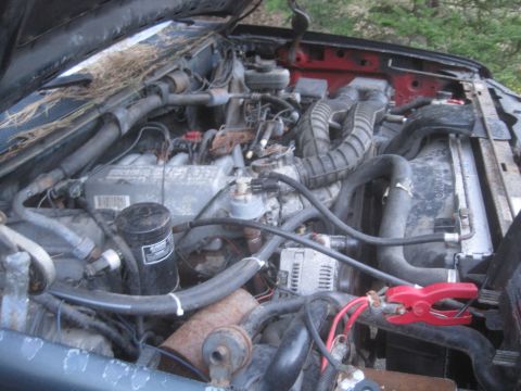 1993 Ford Bronco - The engine bay of a vehicle is shown with various components and wiring. A watermark for SuperMotors is visible at the bottom right.