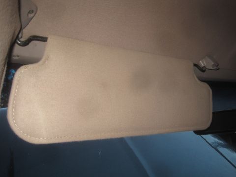 1993 Ford Bronco - Interior view of a tan sun visor, likely from a vehicle part-out.