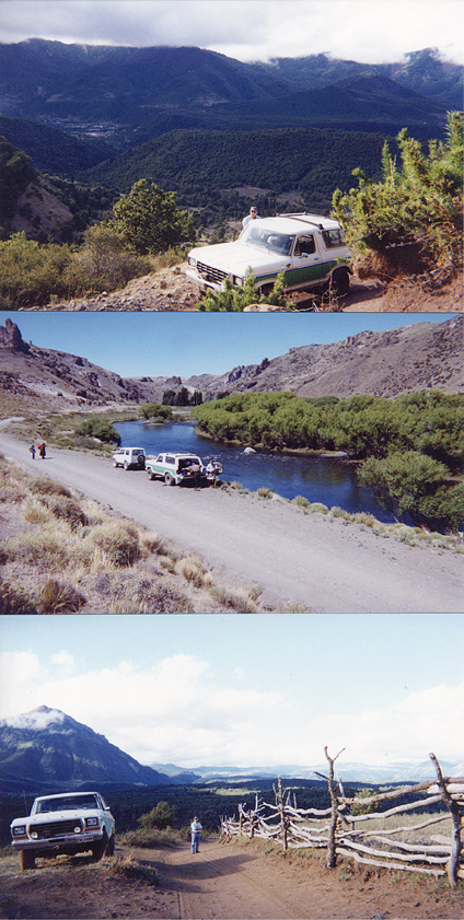 1979 Ford Bronco - A white and green Ford Bronco is parked on a dirt incline with a mountainous landscape in the background.