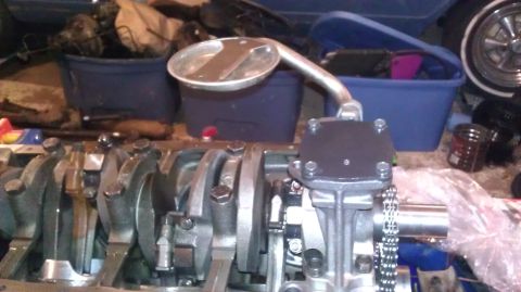 1973 Ford Torino - Close-up of an engine block assembly, including the crankshaft and oil pump components.
