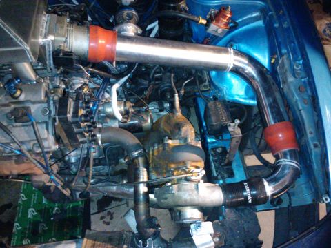 1995 Ford Probe - Custom engine modifications are visible, including a turbocharger and intercooler piping.