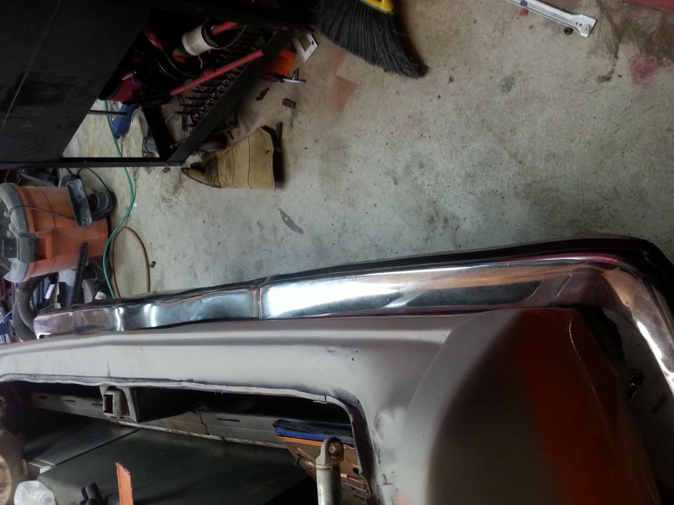 Chrome bumper and fender section of a car