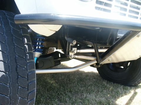 2000 Ford F-250 - Custom suspension components are visible on this off-road truck, including upgraded shocks and linkages.