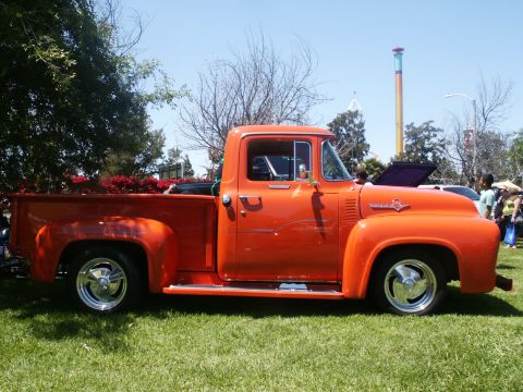 2000 Ford F-250 - This vintage Ford F-100 pickup truck is displayed outdoors on a sunny day.
