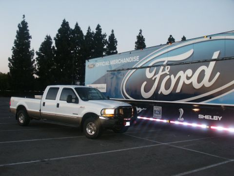 2000 Ford F-250 - 2000 Ford F-250 Super Duty parked next to a Ford official merchandise trailer.