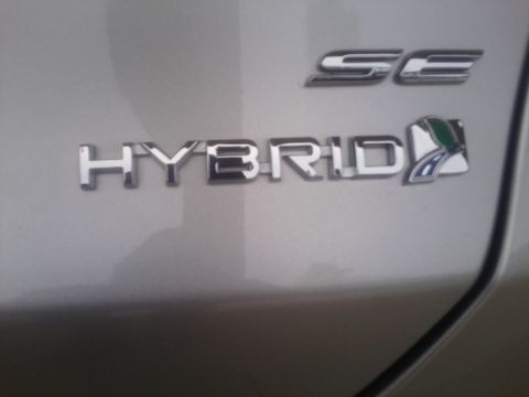 2000 Ford F-250 - The vehicle has a 'HYBRID SE' badge, indicating it is a hybrid model.