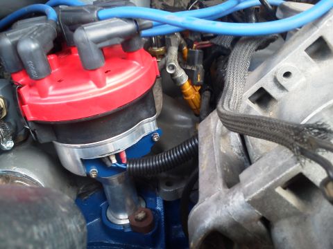 1988 Ford Bronco - Engine bay detail with distributor, fuel injectors, and wiring harness visible.