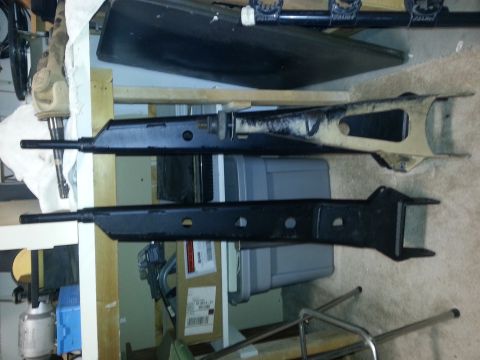 1991 Ford Bronco - Two vehicle suspension components are shown, possibly for a lift kit installation.