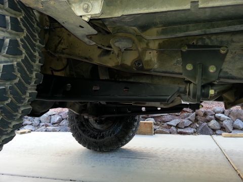 1991 Ford Bronco - Close-up of the undercarriage and suspension system on a modified truck.