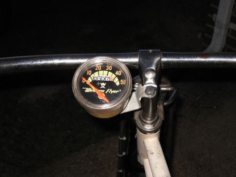 1994 Ford Bronco - Close-up of a vintage bicycle's handlebar a Western Flyer speedometer.