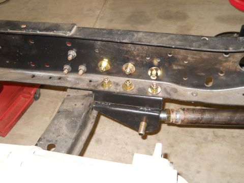 1992 Ford Bronco - This image shows a section of a vehicle's frame with various fasteners and fittings installed.