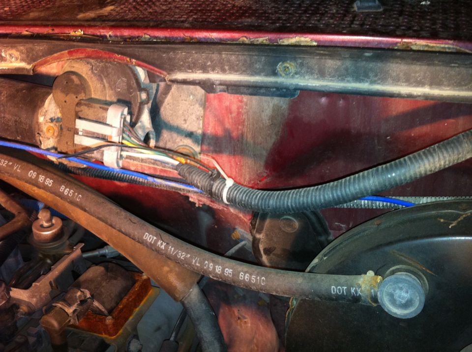 Brake Booster Vacuum/ Wiper motor harness/ A/C line to compressor below brake booster VAC.