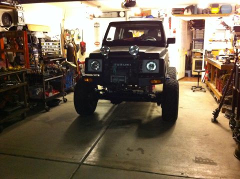1987 Suzuki Samurai - This 1987 Suzuki Samurai is parked inside a garage, ready for its next adventure.