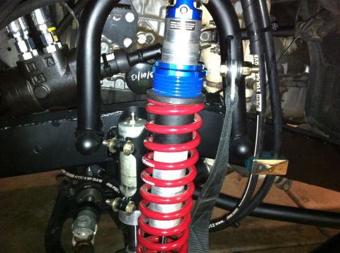 1987 Suzuki Samurai - Custom suspension components are visible in this close-up shot.