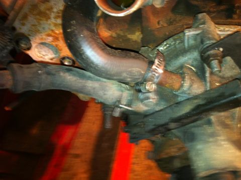 1996 Ford Bronco - Water pump hose connections.