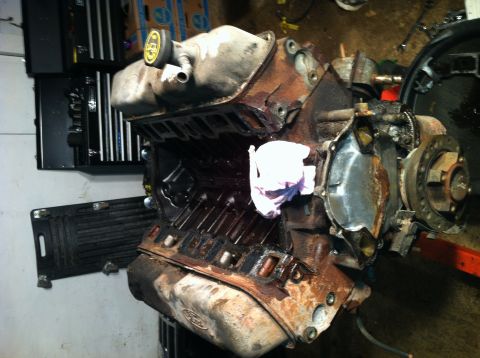 1996 Ford Bronco - A disassembled Ford V8 engine block is shown, with a rag stuffed into one of the cylinders.
