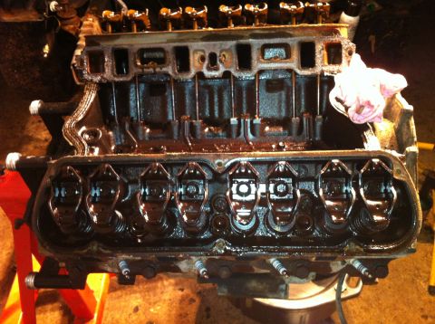 1996 Ford Bronco - The internal components of an engine are visible after the valve covers have been removed.