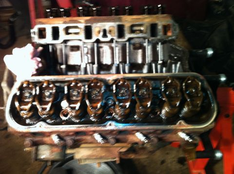 1996 Ford Bronco - Close-up view of an engine's internal components, including rocker arms and pushrods.
