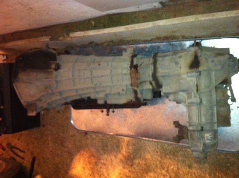 1996 Ford Bronco - This is a transmission and transfer case assembly, likely removed from a vehicle for repair or replacement.