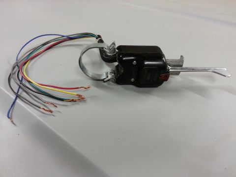 1967 Ford F-100 - A close-up view of a vehicle's turn signal switch and its wiring harness.